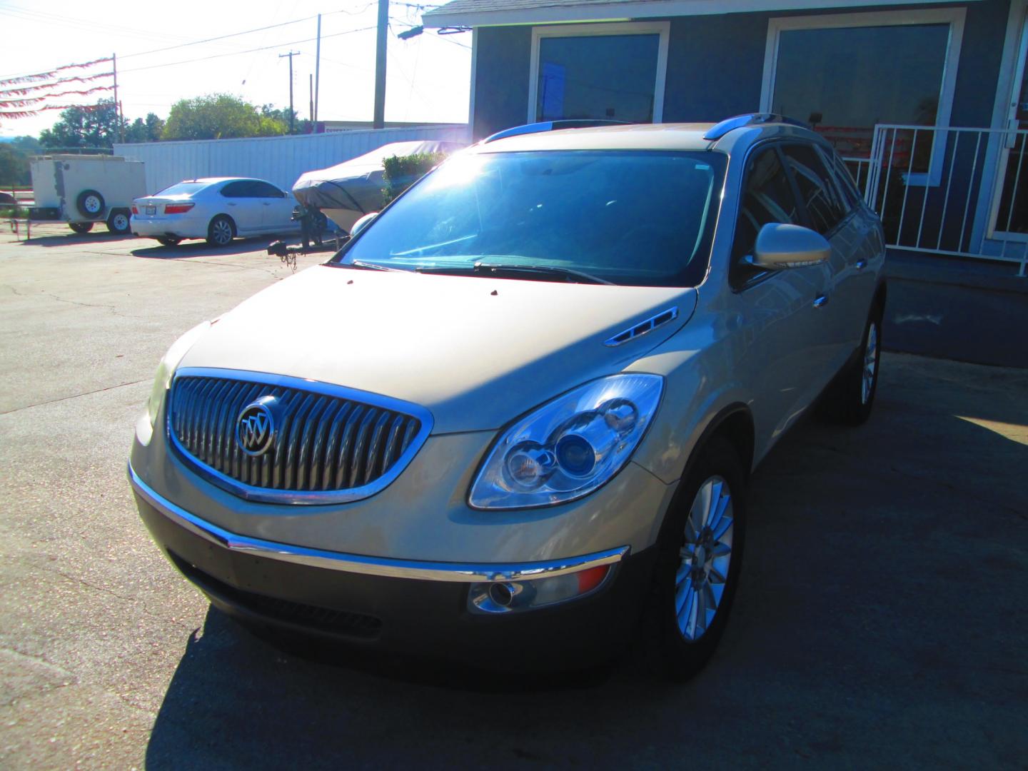 2012 GOLD Buick Enclave Leather AWD (5GAKVCED6CJ) with an 3.6L V6 DOHC 24V engine, 6-Speed Automatic Overdrive transmission, located at 1815 NE 28th St., Fort Worth, TX, 76106, (817) 625-6251, 32.795582, -97.333069 - Photo#0